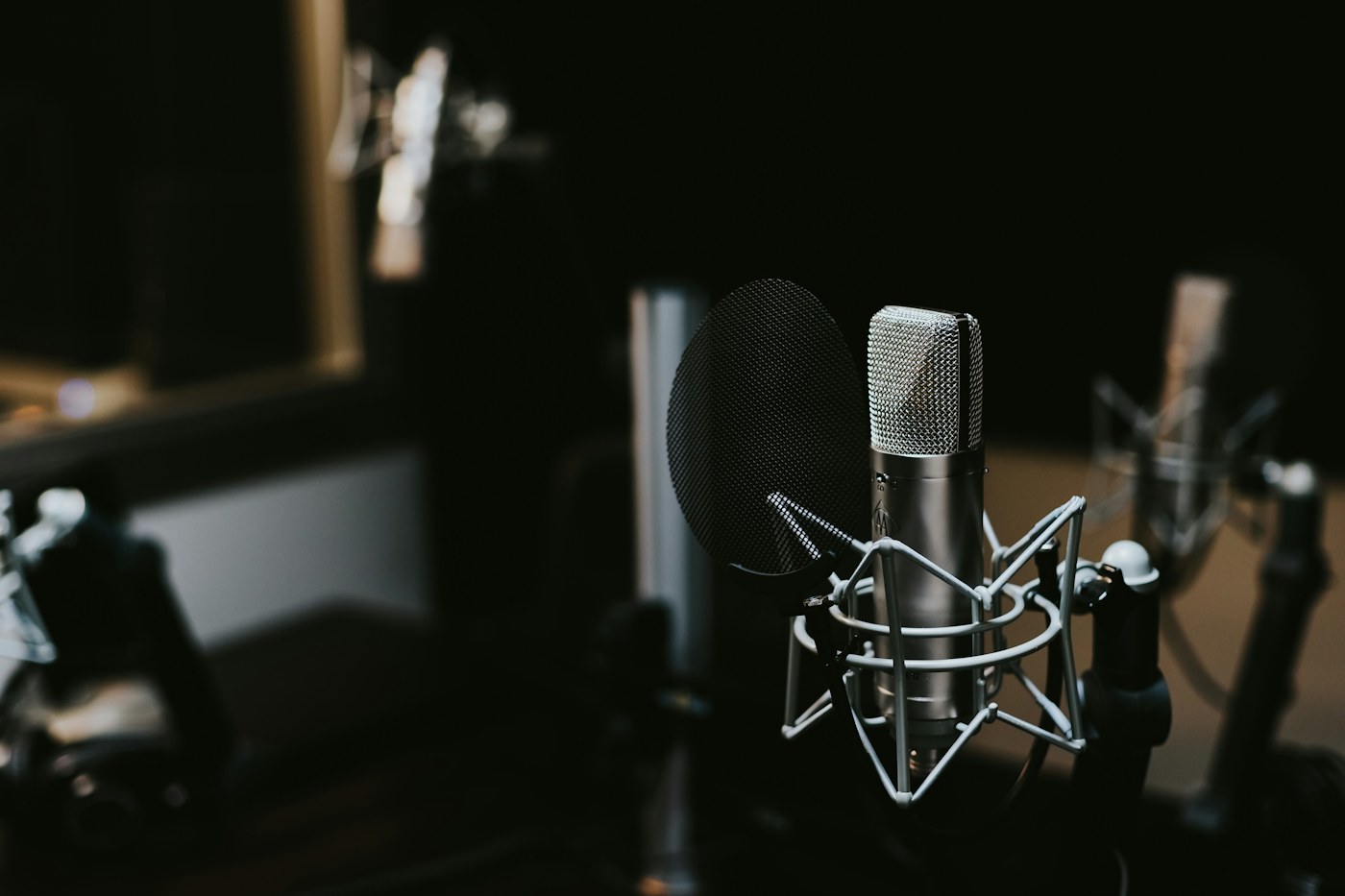 High-quality condenser microphone under studio lighting